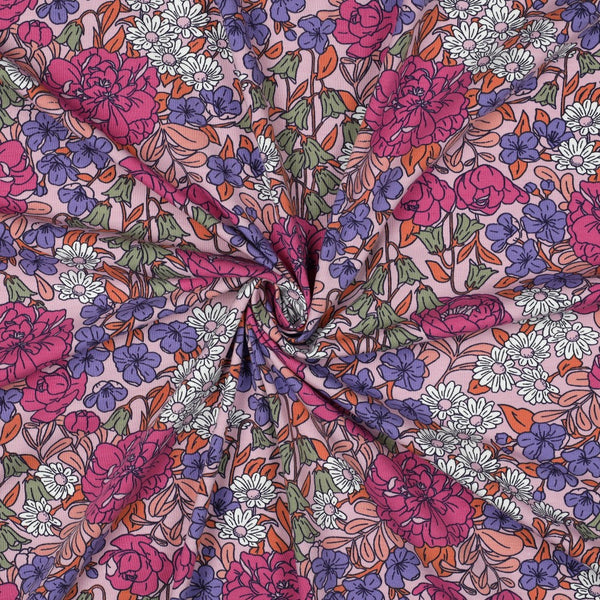 Jersey "Fleurs des champs" sur fond rose certifiée oeko-tex (prix pour 10cm)