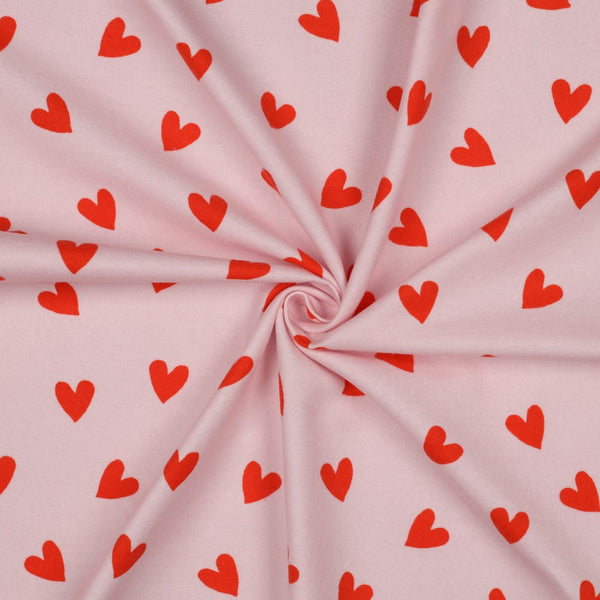 Flanelle 100% coton certifié oeko-tex - Coeurs mauves sur fond rose (prix pour 10cm)