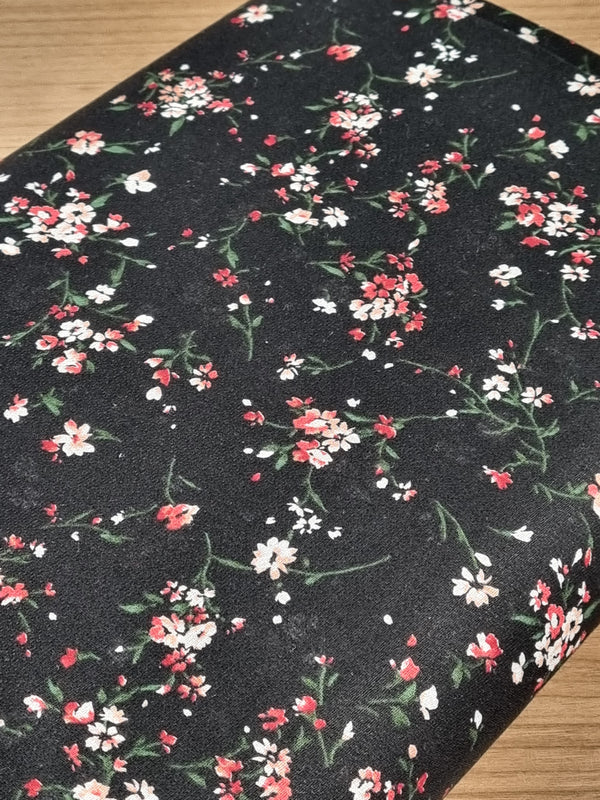 Coupon de 1,2m de Crêpe de coton "bouquets fleuris" sur fond noir de marque Kokka