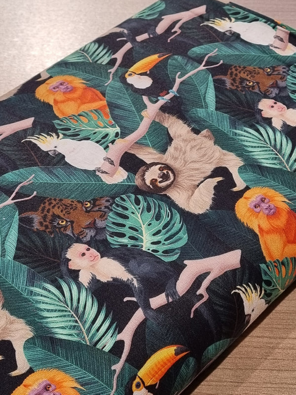 Popeline 100% coton "Jungle sur fond noir" certifiée Oeko-Tex (prix pour 10cm)
