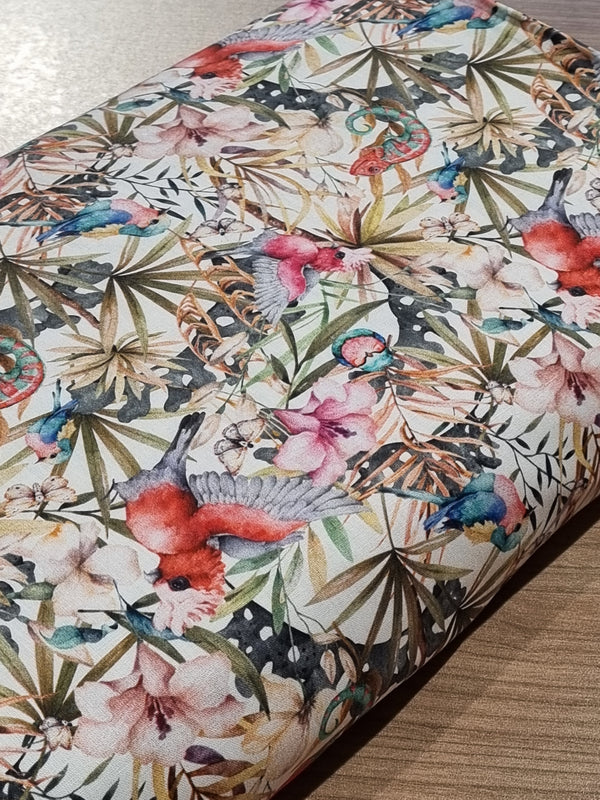 Popeline 100% coton "Sous les tropiques sur fond blanc" certifiée Oeko-Tex (prix pour 10cm)