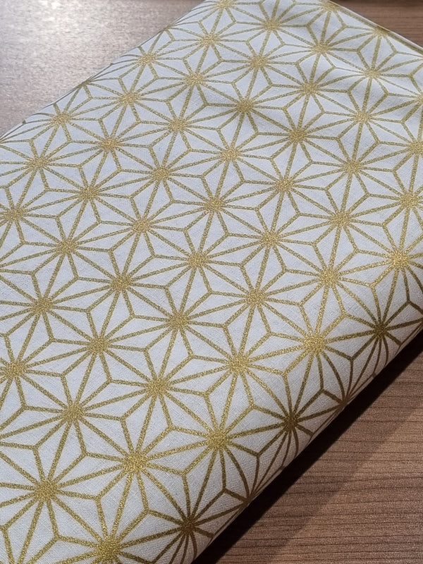 Tissu asanoha dorés sur fond blanc (prix pour 10cm)