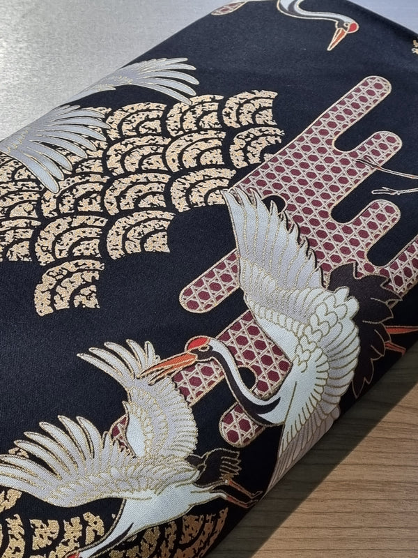 Tissu grues blanches sur fond noir (prix pour 10cm)
