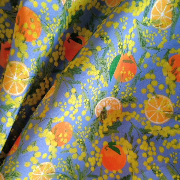 Tissu 100% coton "mimosa et oranges sur fond bleu" certifié Oeko Tex (prix pour 10cm)