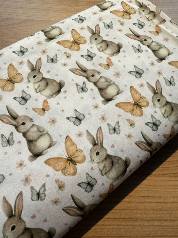 Popeline 100% coton "Lapins et papillons" certifiée Oeko-Tex (prix pour 10cm)