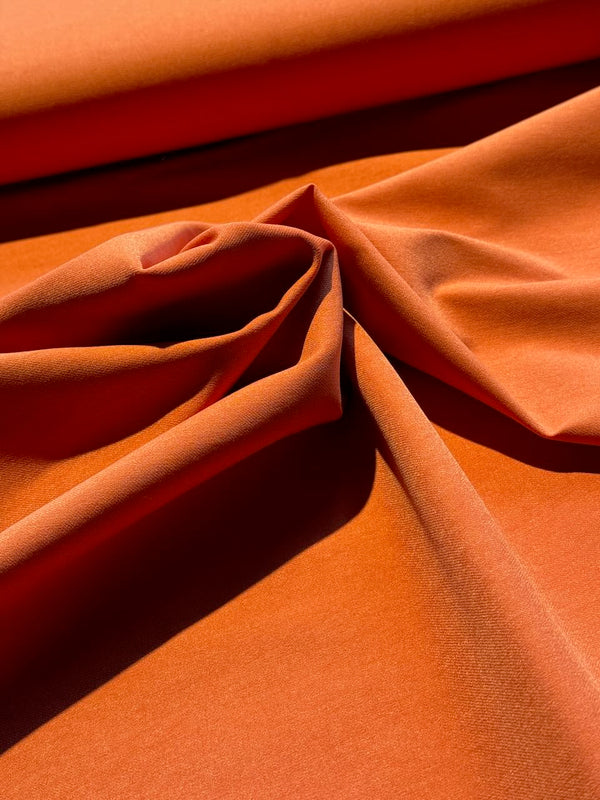 Tissus stretch "Priscilla" orange (prix pour 10cm)
