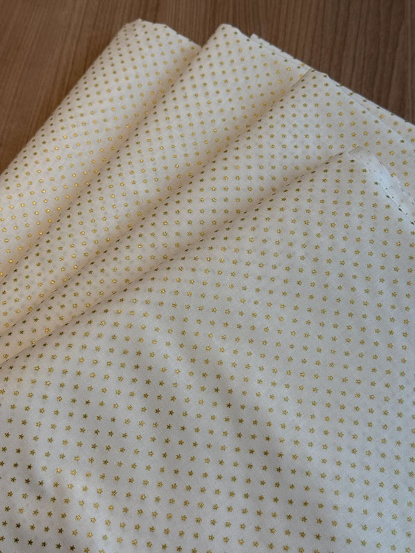 Superbe coupon 3m de popeline "Etoiles dorées sur fond crème avec foil" - 110cm de large