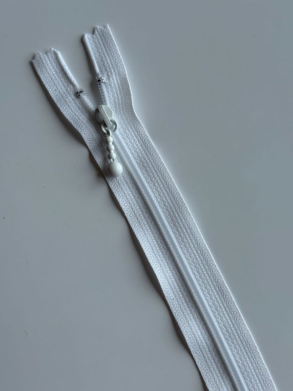 YKK - zip non séparable 20cm avec curseur décoration boule - couleur blanc 501  (prix à la pièce)