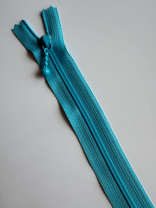 YKK - zip non séparable 20cm avec curseur décoration boule - couleur turquoise 547  (prix à la pièce)
