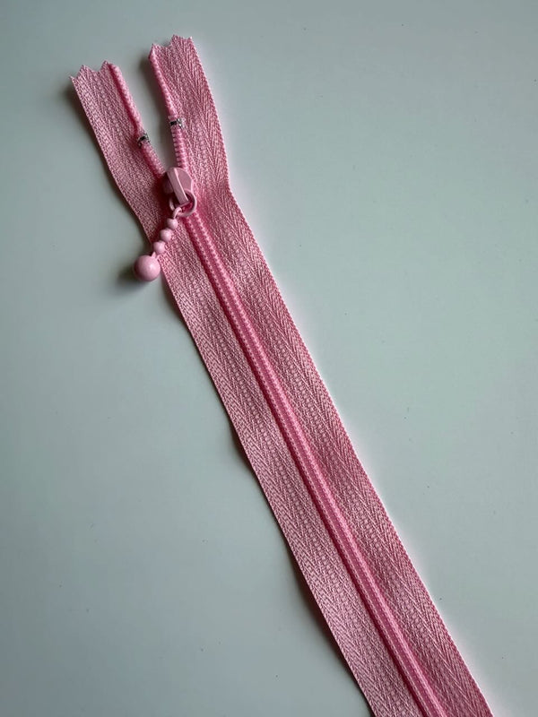 YKK - zip non séparable 20cm avec curseur décoration boule - couleur rose 513 (prix à la pièce)