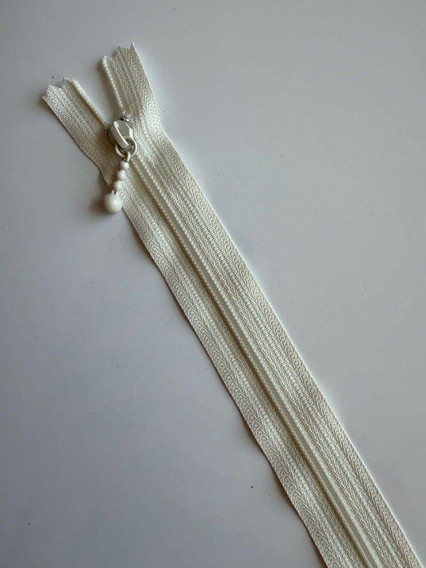 YKK - zip non séparable 20cm avec curseur décoration boule - couleur écru 841 (prix à la pièce)