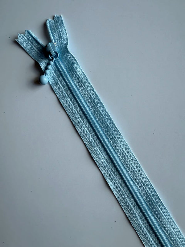 YKK - zip non séparable 20cm avec curseur décoration boule - couleur bleu clair 542 (prix à la pièce)