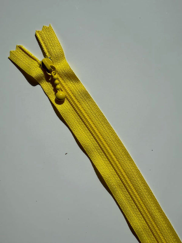 YKK - zip non séparable 20cm avec curseur décoration boule - couleur jaune 504 (prix à la pièce)