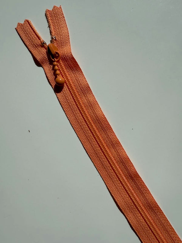 YKK - zip non séparable 20cm avec curseur décoration boule - couleur  mandarine 522 (prix à la pièce)