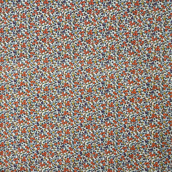 Cotton lawn "Fleurettes ton orangé" de marque Kokka (prix pour 10cm)