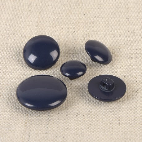 Boutons à pied de 22mm - bleu marine (prix à la pièce)