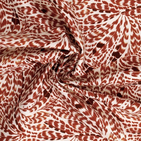 Popeline 100% coton "Plumes tons automnaux" (prix pour 10cm)