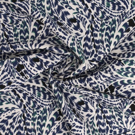 Popeline 100% coton "Plumes bleu" (prix pour 10cm)