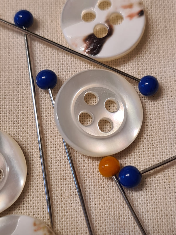 Boutons nacre blanc iridescent 12mm (prix à la pièce)