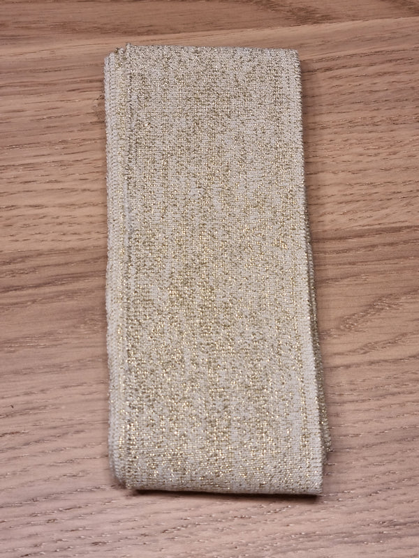 Bord cote  " lurex or" ( prix à la pièce 110cm X 6cm)
