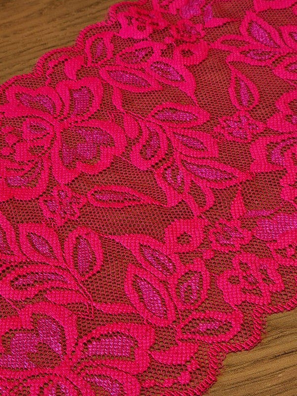 Dentelle lycra de 15cm rose fluo ( prix par 10cm)