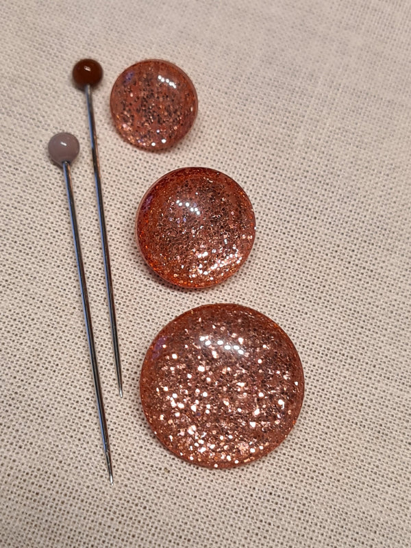 Boutons pailletés roses de 14mm (prix à la pièce)