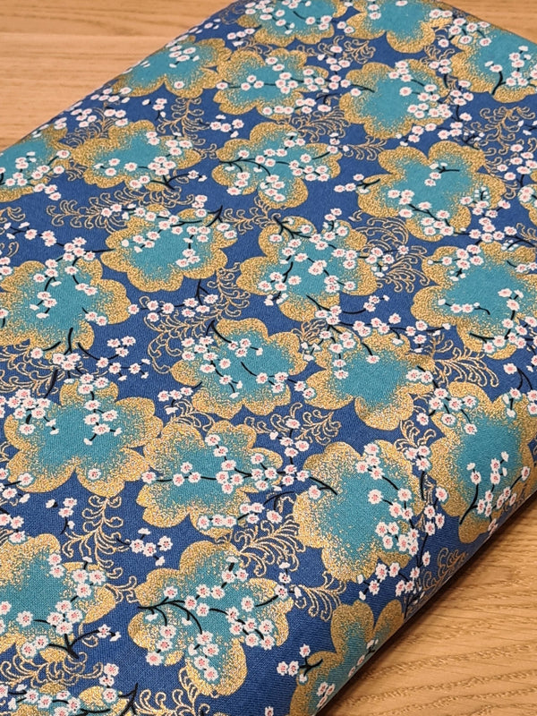 Umebana turquoises et dorés sur fond bleu (prix pour 10cm)