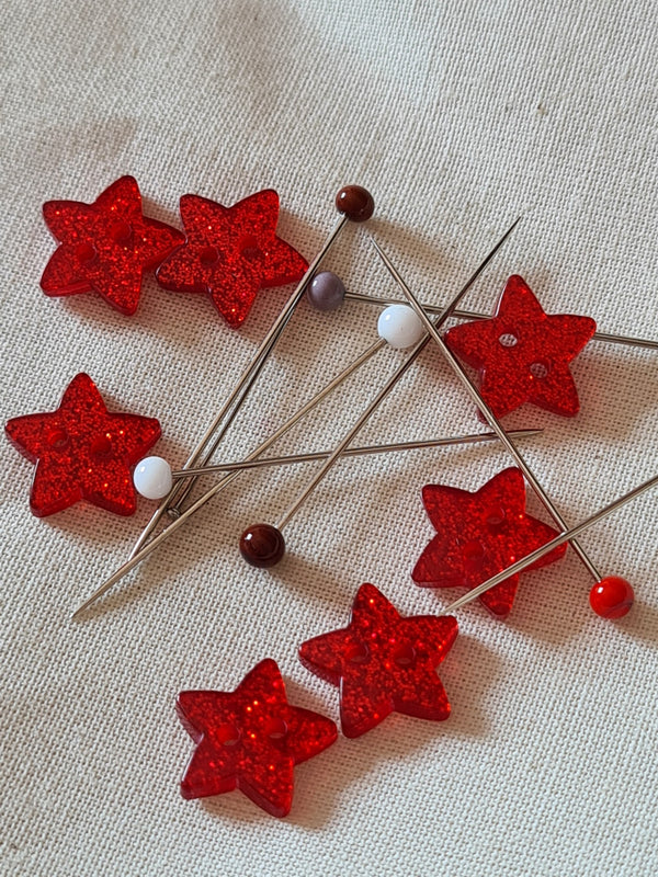 Boutons Etoiles rouges et pailletées 11mm (prix à la pièce)